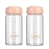 COMI wide-neck glass breastmilk bottle close-up, showing borosilicate safety for storage