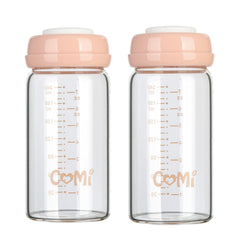 COMI wide-neck glass breastmilk bottle close-up, showing borosilicate safety for storage