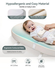 COMOMY contoured-walls help keep baby safely centered during changes.