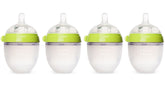 Comotomo four-pack 5 oz green bottles show easy-clean wide neck design for busy parents