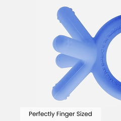 Comotomo teether blue in-hand use demonstrates ergonomic baby-friendly grip