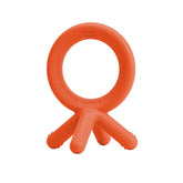 Comotomo silicone baby teether orange closeup highlighting soft, safe chewing comfort.