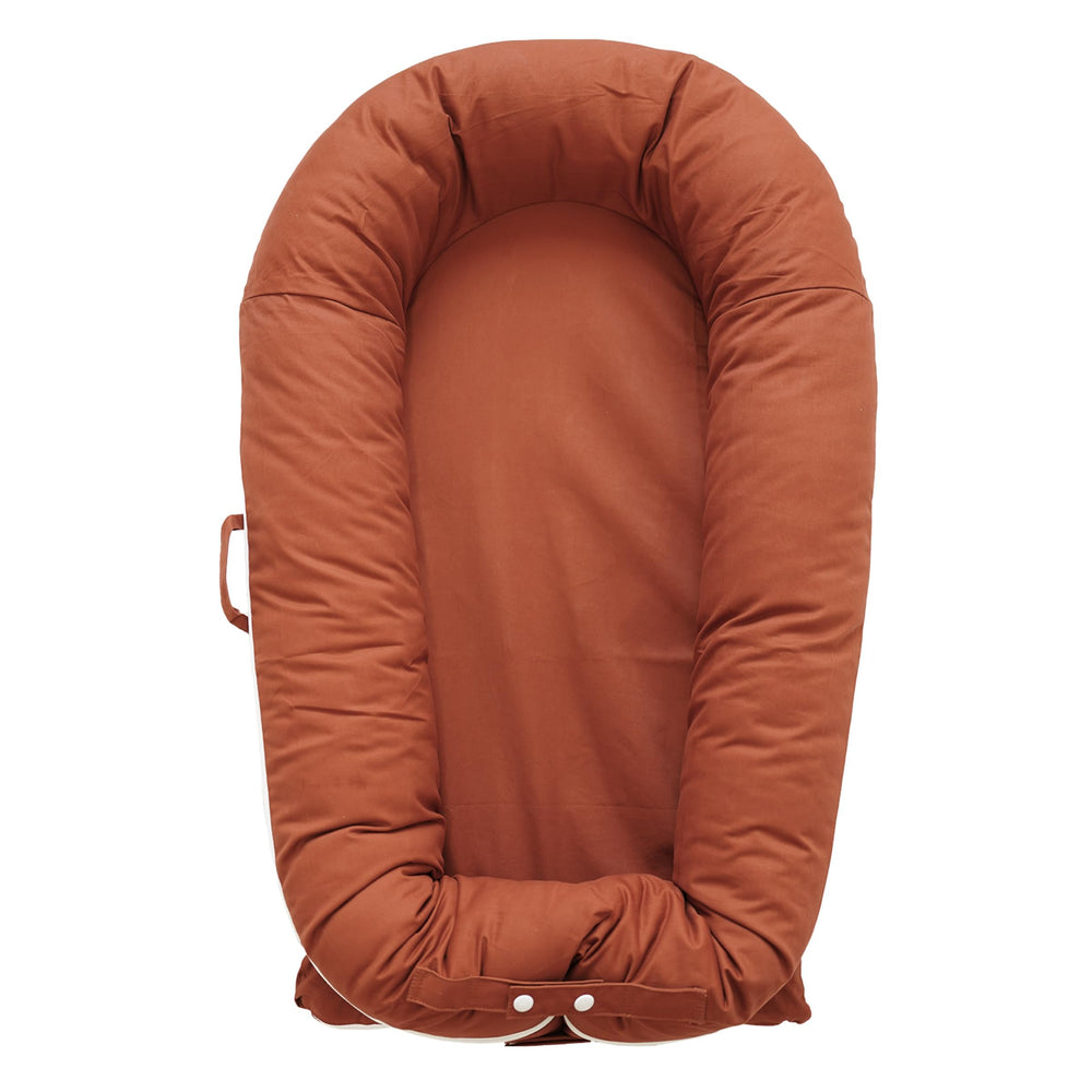 CooCooBaby Deluxe Lounger cocoon close-up shows snug comfort for newborns