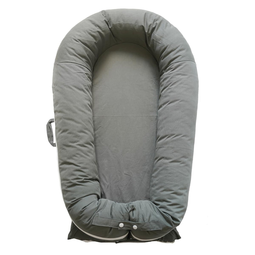 CooCooBaby Deluxe Lounger cocoon provides snug newborn comfort for everyday naps.