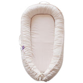 CooCooBaby Infant Lounger cream corduroy cover shows soft, breathable fabric for cozy cuddles and safe lounging.