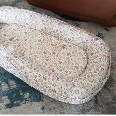 CooCooBaby lounger tummy-time support encourages gentle play and milestone time.