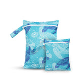 CoolaPeach big wet bag in blue turtle design for waterproof diaper storage.