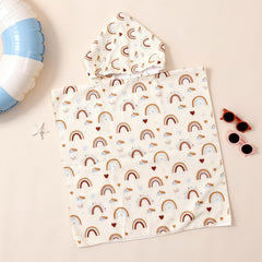 CoolaPeach hooded towel rainbow pattern appealing to kids during bath.