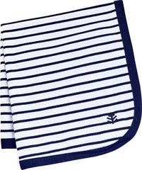 Coolibar baby sun blanket coordinates with UPF 50+ cap for coordinated sun protection on walks.