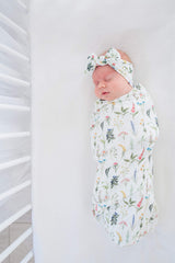 Copper Pearl Baby Bows coordinated-style with swaddles for cohesive outfits