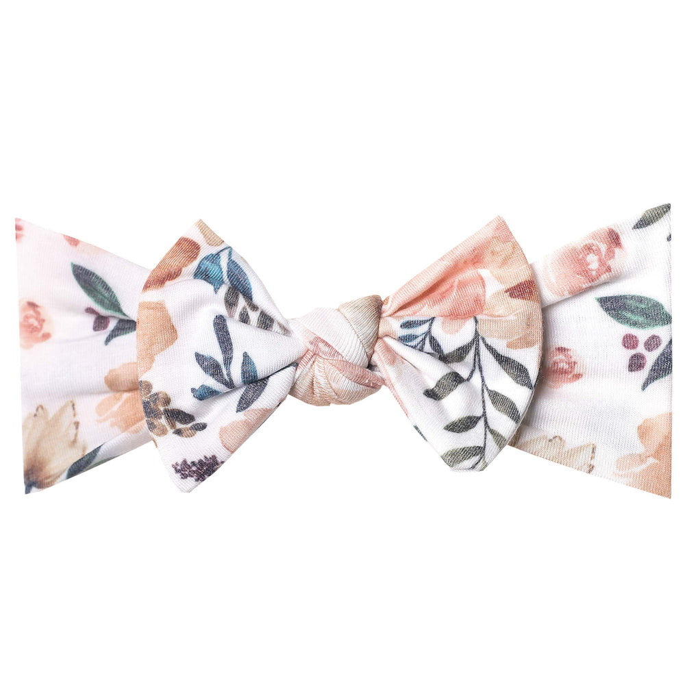 Copper Pearl baby bows closeup on premium-soft fabric for newborn comfort.