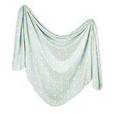 Copper Pearl baby swaddle blanket knit close-up shows soft stretch fabric.