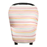 Copper Pearl Belle multi-use cover on a car seat shields sun with breathable fabric.