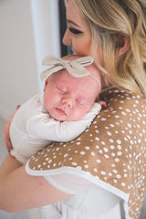 Copper Pearl burp cloth size 21x10 demonstrates generous shoulder coverage for parents