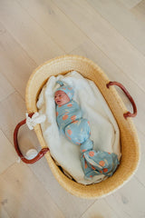 Copper Pearl Clementine swaddle stroller shield in use on a stroller for on-the-go shade.