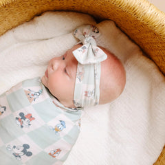 Copper Pearl headband bow with Mickey print on baby for trendy nursery style