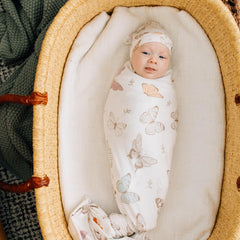 Copper Pearl Luna blanket demonstrates 46 inches by 46 inches size for growing babies