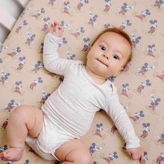 Copper Pearl Mickey Mouse crib sheet with full-elastic edge provides a snug, secure fit.