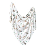 Copper Pearl Noah swaddle blanket fold shows soft premium knit fabric for easy swaddling.