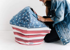 Copper Pearl Patriot all-season design shields baby and caregiver from weather while on the go.