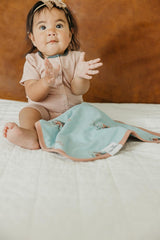 Copper Pearl Ravenclaw gift-ready packaging highlights a thoughtful baby shower gift.