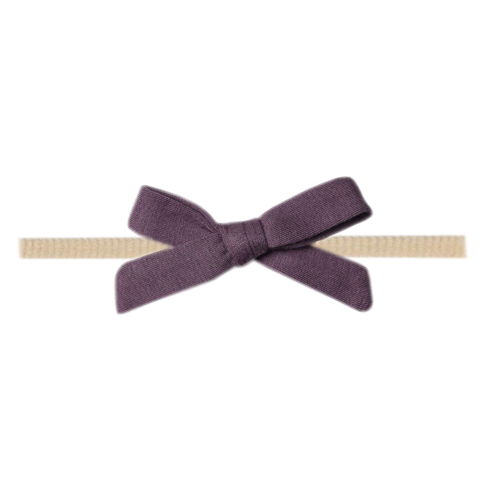 Copper Pearl Ribbon Baby Bow Plum front view highlights soft fabric for gentle wear