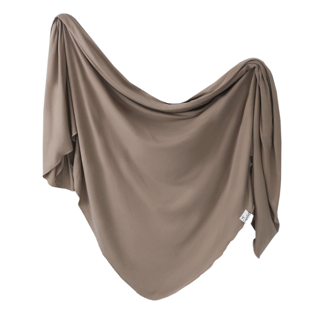 Copper Pearl swaddle blanket Gobi with soft touch for gentle newborn comfort.