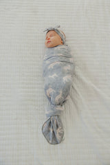 Copper Pearl Timber swaddle folded neatly demonstrating large 46x46 inch size.