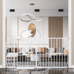 COSEND extra wide baby gate closed in doorway showing safe separation for pets and children.