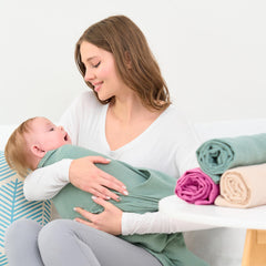 CottCare baby muslin swaddle rose pink fabric close-up highlights soft breathable cotton weave.