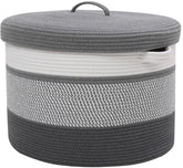 Cottonphant laundry basket with lid keeps clothes concealed and organized.