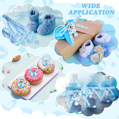 Coume baby shower pacifiers table decor enhances party ambiance.