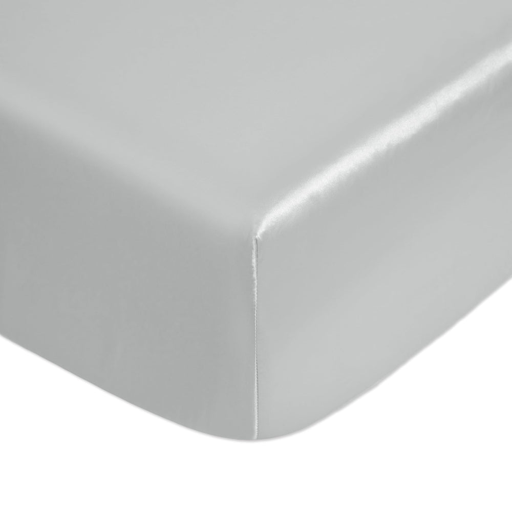 Counfeisly silk satin crib sheet close-up showcases soft, silk-like feel reducing skin irritation.