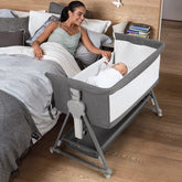 Cowiewie bassinet bedside sleeper with pyramid base provides stable nighttime access.