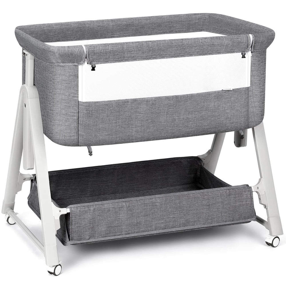 Cowiewie Bassinet bedside sleeper dark gray shown close to bed for easy nighttime access