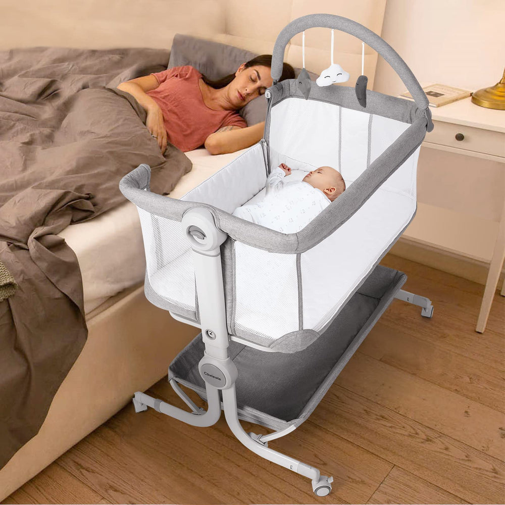 Cowiewie bassinet bedside sleeper side view with easy access for nighttime soothing.