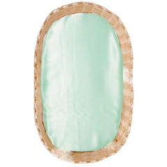 Cozysilk silk bassinet sheet in aqua green on mattress for smooth hair and gentle sleep.