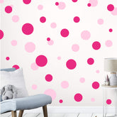 Create-A-Mural polka-dot wall decals closeup shows vibrant pink dots for playful walls.