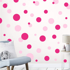 Create-A-Mural polka-dot wall decals closeup shows vibrant pink dots for playful walls.