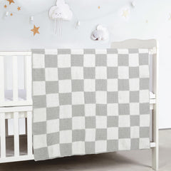 CREVENT baby blanket grey checked nursery scene demonstrating comforting warmth during naps.