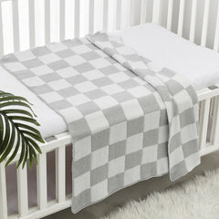 CREVENT tummy-time mat grey checked highlights cuddle-ready comfort during playtime.