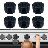 Creztail 6pc knob covers installed on stove knobs for safer family kitchen use.
