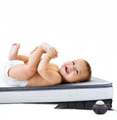 Crib Cloud inflatable wedge pillow with quiet hand pump for smooth inflation.