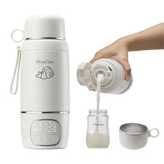 CrystCare portable milk warmer demonstrates its compact travel design for on-the-go feeding.