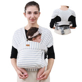 CUBY newborn wrap with green stripe shows baby securely seated for ergonomic comfort
