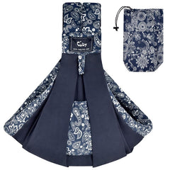 CUBY Wrap Baby Sling Carrier in dark blue floral worn in front carry for bonding