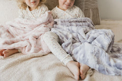 Cuddle Cookie Baby Blanket grey closeup plush softness for cozy snuggles