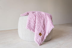 Cuddle Cookie Baby 27x33 blanket displayed on crib, demonstrating generous coverage for naps
