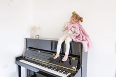 Cuddle Cookie Baby pink blanket closeup texture showcases plush softness and warmth for snuggly moments