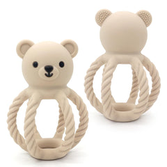 CuddleCubs bear toy rattle demonstrates rustling sound to engage baby's attention and motor skills.